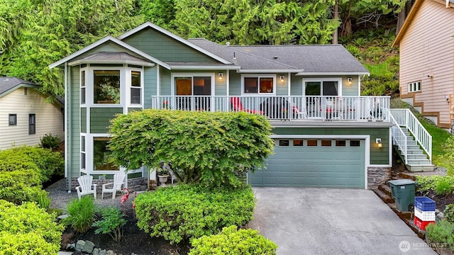 22 Inlet Cir, Bellingham, WA 98229 - single story home with driveway, stairway, roof with shingles, stone siding, and an attached garage