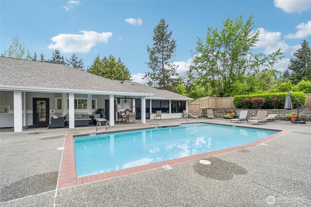 15150 140th Way SE Unit T304, Renton, WA 98058 - view of pool with a patio area, an outdoor hangout area, and a sunroom