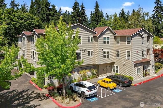 20800 72nd Ave W Unit 202, Edmonds, WA 98026 - view of property with uncovered parking