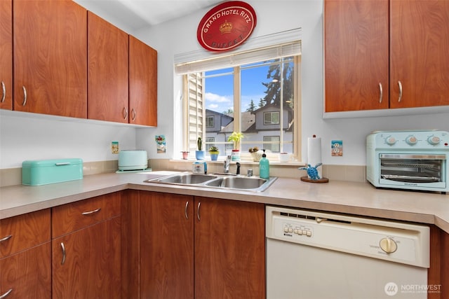20800 72nd Ave W Unit 202, Edmonds, WA 98026 - kitchen featuring dishwasher, light countertops, and brown cabinetry