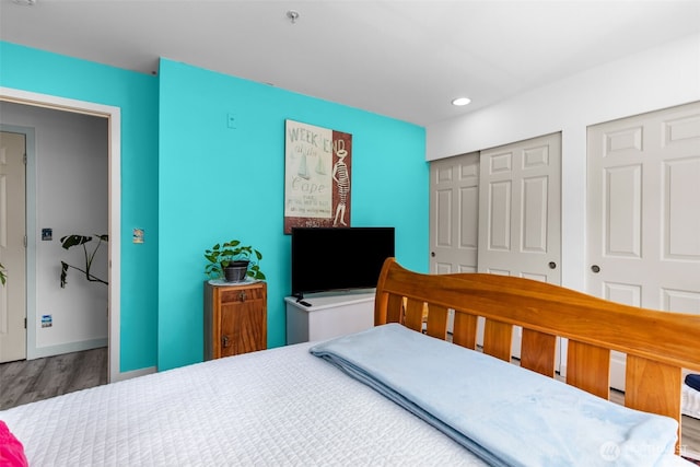 20800 72nd Ave W Unit 202, Edmonds, WA 98026 - bedroom featuring wood finished floors, recessed lighting, and a closet