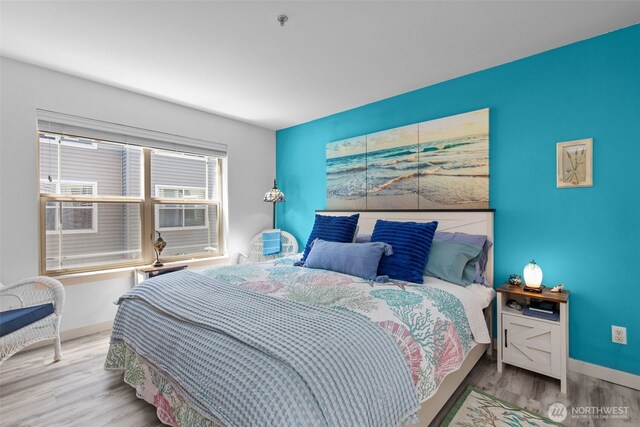 20800 72nd Ave W Unit 202, Edmonds, WA 98026 - bedroom with wood finished floors and cooling unit