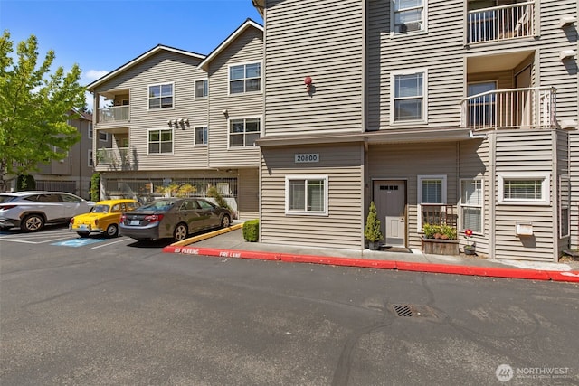 20800 72nd Ave W Unit 202, Edmonds, WA 98026 - view of building exterior with uncovered parking