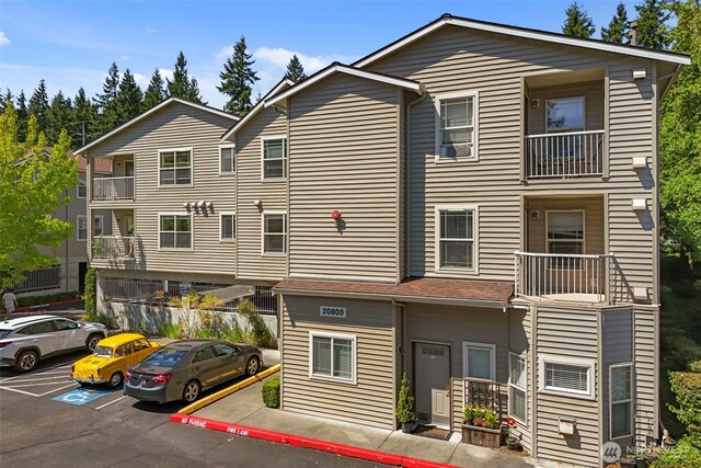 20800 72nd Ave W Unit 202, Edmonds, WA 98026 - view of building exterior featuring uncovered parking