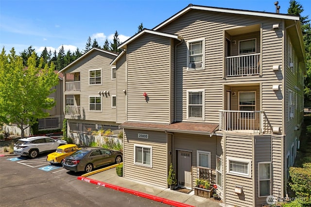 20800 72nd Ave W Unit 202, Edmonds, WA 98026 - view of building exterior with uncovered parking