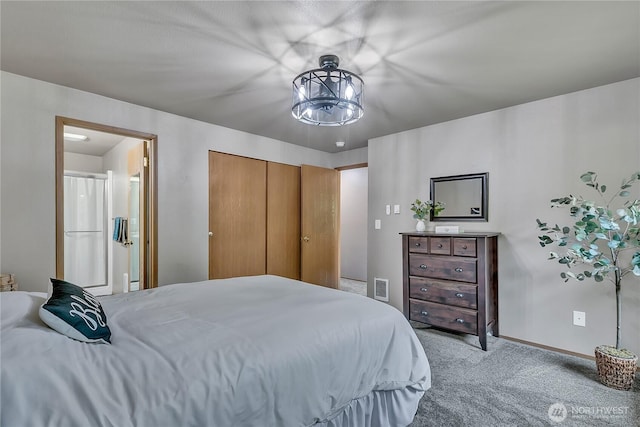 56065608 76th Street Ct E, Puyallup, WA 98371 - carpeted bedroom featuring baseboards and connected bathroom