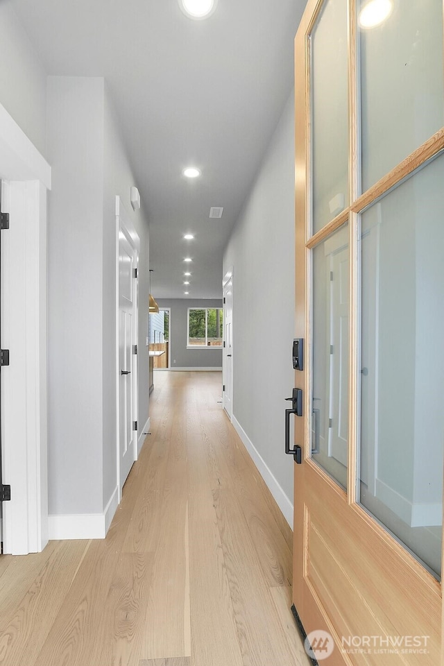 8010 222nd St SW, Edmonds, WA 98026 - hallway featuring light wood finished floors, baseboards, and recessed lighting