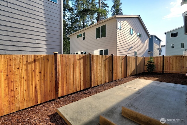 8010 222nd St SW, Edmonds, WA 98026 - view of property exterior with a patio and a fenced backyard