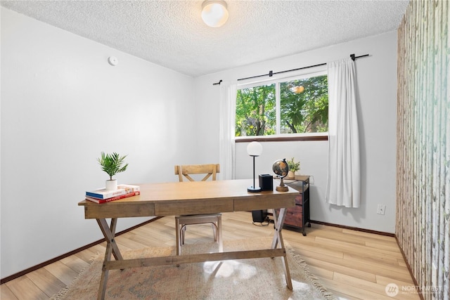 22412 110th Ave SE, Kent, WA 98031 - office area featuring a textured ceiling, baseboards, and light wood finished floors