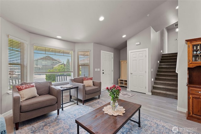 2562 Fancher Heights Blvd, East Wenatchee, WA 98802 - living room featuring stairs, baseboards, light wood-style floors, recessed lighting, and lofted ceiling