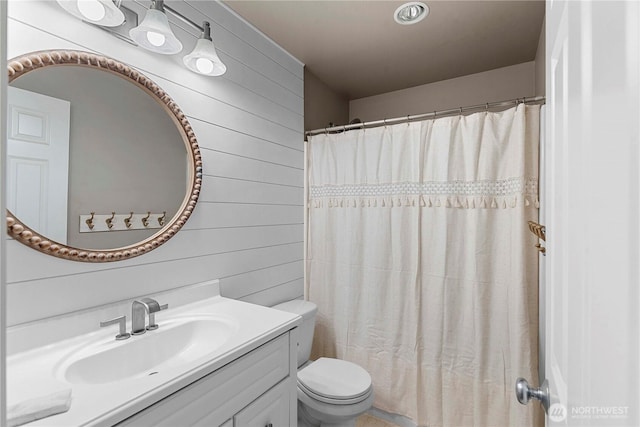 2562 Fancher Heights Blvd, East Wenatchee, WA 98802 - full bath with toilet, vanity, wood walls, and a shower with shower curtain