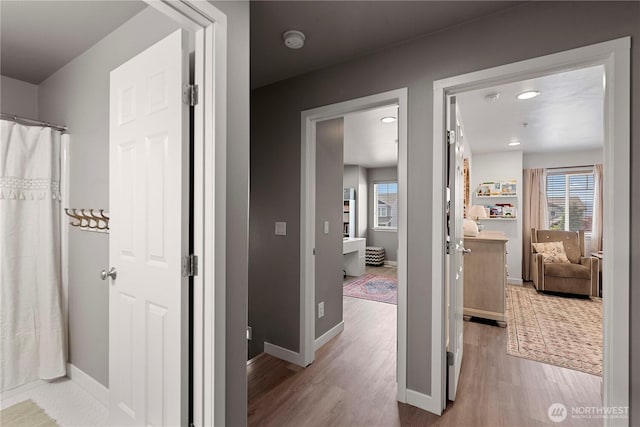 2562 Fancher Heights Blvd, East Wenatchee, WA 98802 - corridor with wood finished floors, baseboards, and recessed lighting