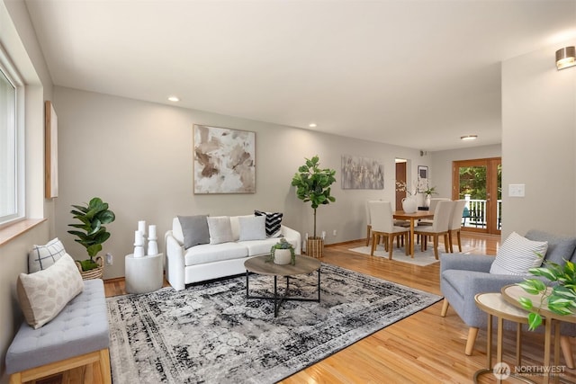 24390 Mount Washington View Ln NW, Poulsbo, WA 98370 - living room featuring wood finished floors and recessed lighting