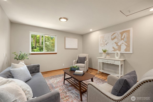 24390 Mount Washington View Ln NW, Poulsbo, WA 98370 - living area with attic access, wood finished floors, recessed lighting, and baseboards