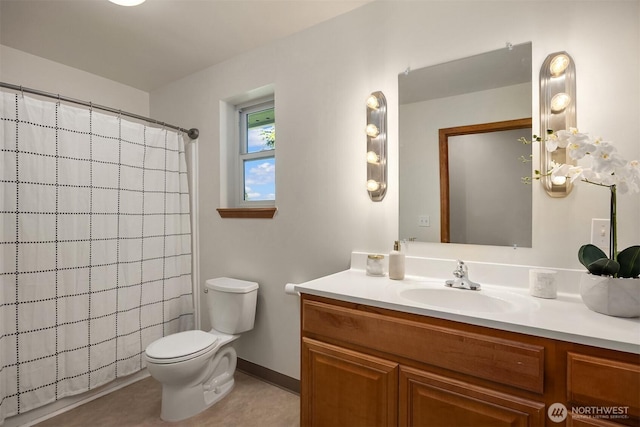 24390 Mount Washington View Ln NW, Poulsbo, WA 98370 - full bath with vanity, toilet, a shower with curtain, and baseboards