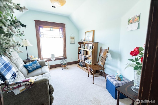 600 12th St, Bridgeport, WA 98813 - sitting room with lofted ceiling, carpet, and baseboards