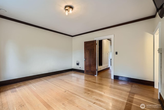 625 5th Ave S, Kent, WA 98032 - spare room featuring baseboards, light wood-style floors, and crown molding