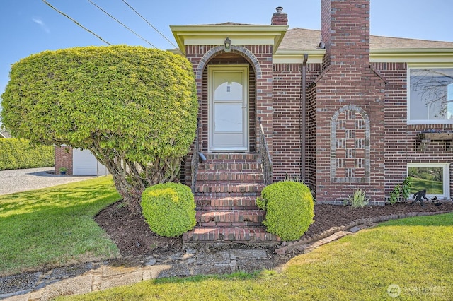 10758 22nd Ave SW, Seattle, WA 98146 - entrance to property with a chimney, a lawn, and brick siding