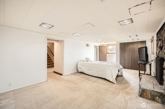 10758 22nd Ave SW, Seattle, WA 98146 - bedroom with light carpet and baseboards