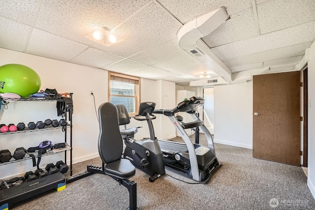 10758 22nd Ave SW, Seattle, WA 98146 - workout room featuring a paneled ceiling and baseboards