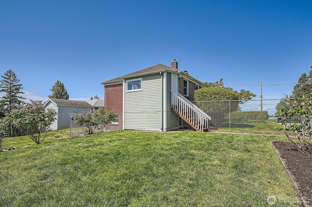 10758 22nd Ave SW, Seattle, WA 98146 - back of house featuring a chimney and stairs