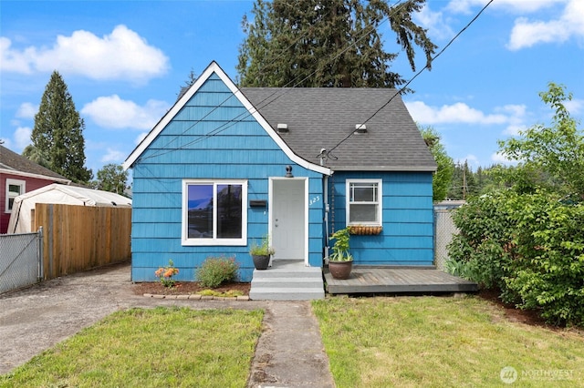 325 NW 2nd Ave, Kelso, WA 98626 - bungalow with roof with shingles and a wooden deck