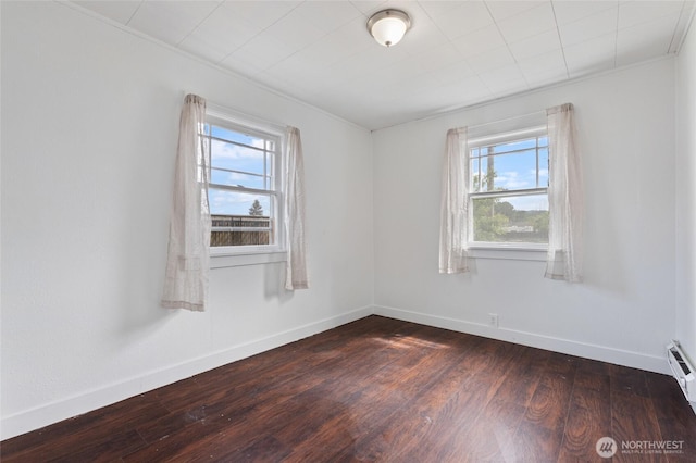 325 NW 2nd Ave, Kelso, WA 98626 - empty room featuring dark wood-style floors and baseboards