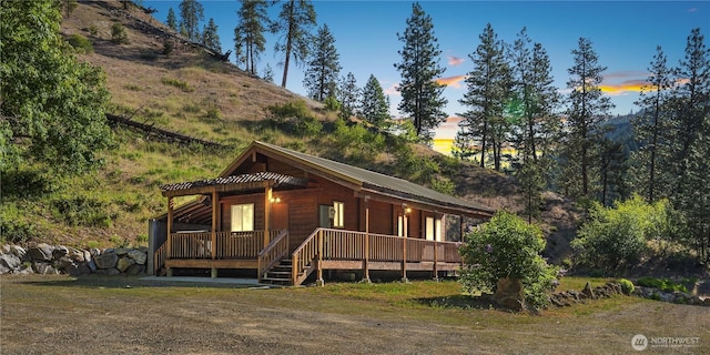 9460 Eagle Creek Rd, Leavenworth, WA 98826 - view of front of house featuring a porch and metal roof