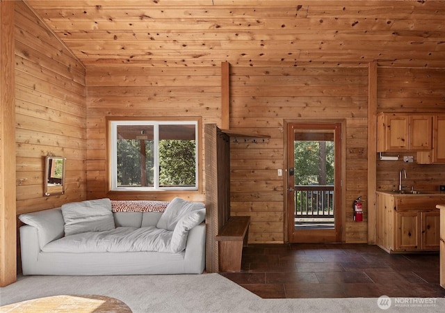 9460 Eagle Creek Rd, Leavenworth, WA 98826 - living area with lofted ceiling, wood walls, and wood ceiling