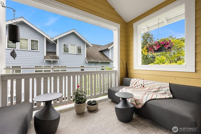 156 Hall Brothers Loop NE Unit 201, Bainbridge Island, WA 98110 - view of patio / terrace with a balcony
