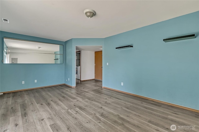 9201 S G St, Tacoma, WA 98444 - spare room featuring wood finished floors and baseboards