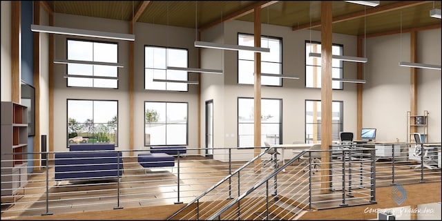 73 E Shop Ave Unit C6, Chelan, WA 98816 - interior space with a high ceiling, wood finished floors, and a desk