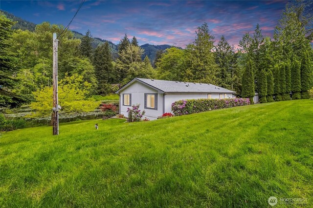 495 Lakeside Dr, Sedro Woolley, WA 98284 - view of home's exterior featuring a yard and a forest view