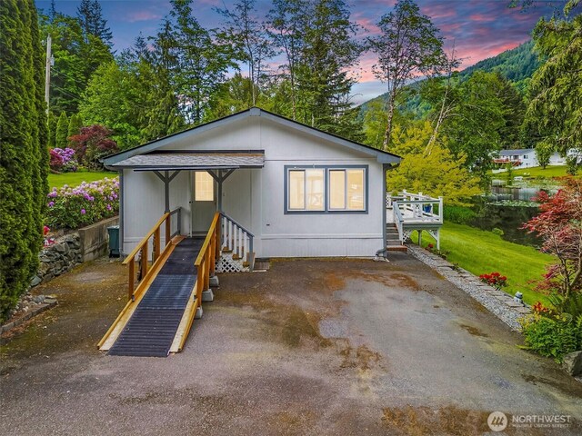 495 Lakeside Dr, Sedro Woolley, WA 98284 - view of front facade featuring a wooden deck and stairs