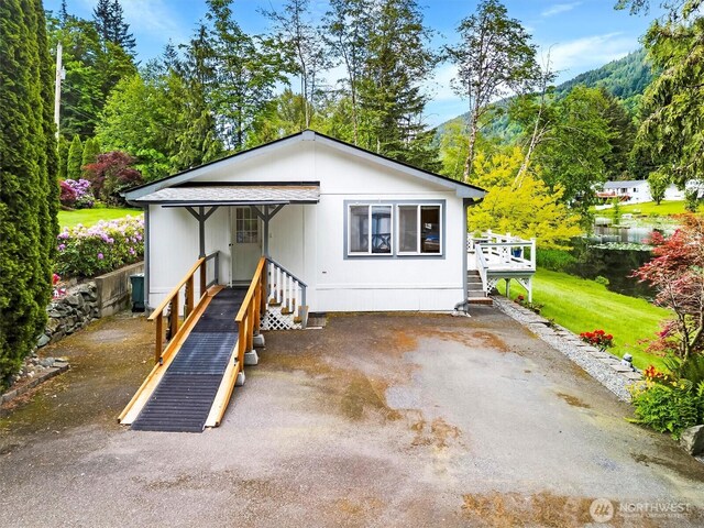 495 Lakeside Dr, Sedro Woolley, WA 98284 - view of front of house with stairway and a deck