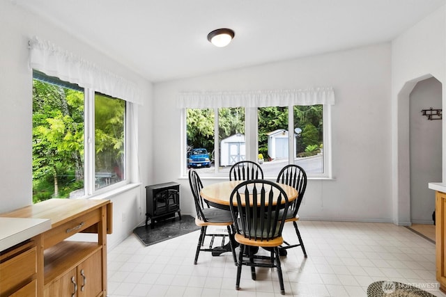 495 Lakeside Dr, Sedro Woolley, WA 98284 - dining area with a wood stove and arched walkways