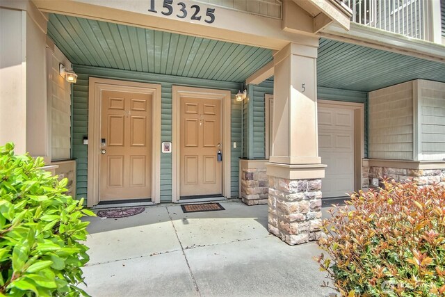 15325 SE 155th Pl Unit N5, Renton, WA 98058 - property entrance with stone siding and covered porch