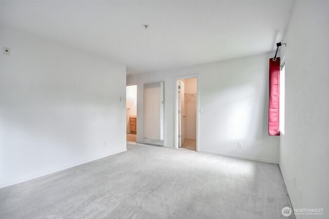 15325 SE 155th Pl Unit N5, Renton, WA 98058 - spare room with carpet flooring, baseboards, and fire sprinkler in ceiling