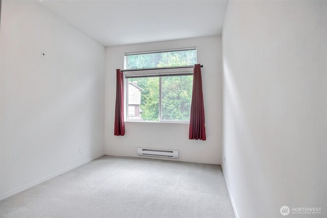 15325 SE 155th Pl Unit N5, Renton, WA 98058 - carpeted empty room featuring a baseboard radiator and baseboards