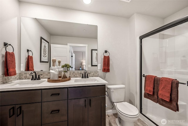 12111 127th Avenue Ct E Unit 92, Puyallup, WA 98374 - full bathroom featuring toilet, a stall shower, and double vanity