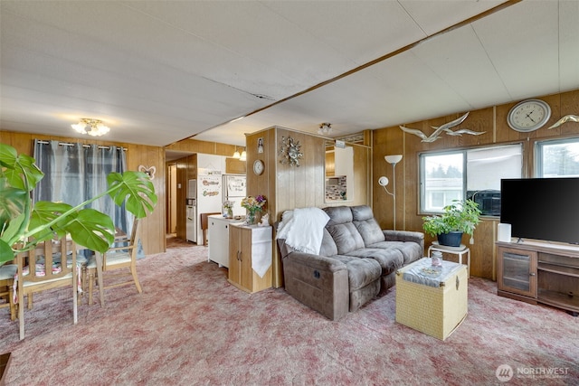 18501 52nd Ave W Unit 44, Lynnwood, WA 98037 - living area featuring wood walls and carpet