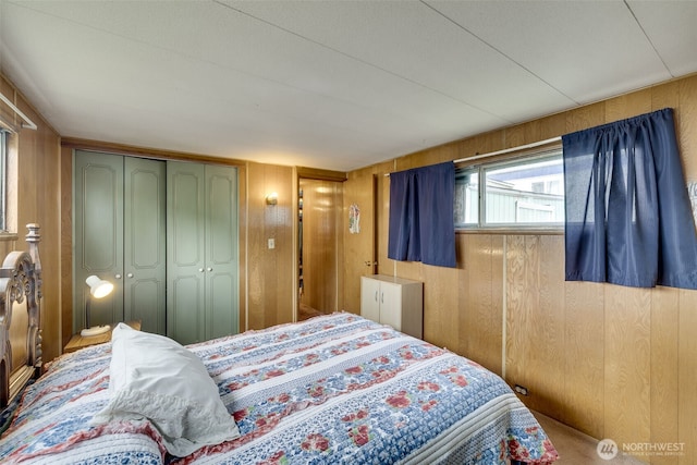 18501 52nd Ave W Unit 44, Lynnwood, WA 98037 - carpeted bedroom with wood walls and a closet