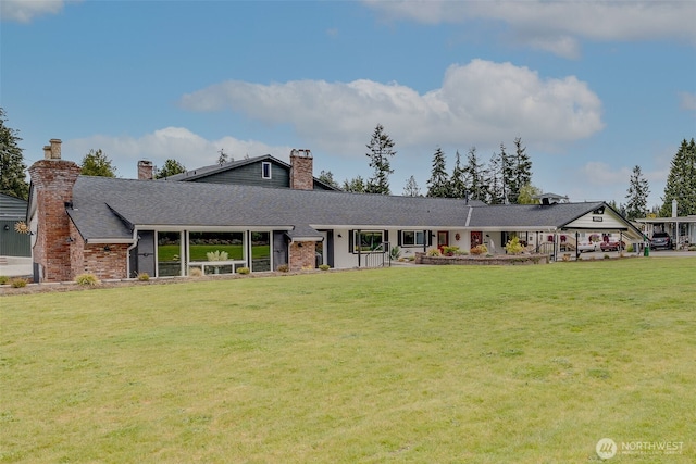 18501 52nd Ave W Unit 44, Lynnwood, WA 98037 - view of front of property featuring a chimney, a front lawn, and a shingled roof