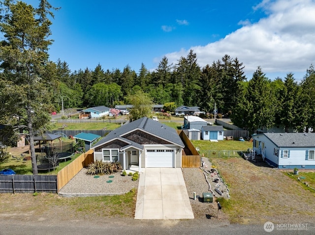 2201 303rd Pl, Ocean Park, WA 98640 - view of front of house featuring an attached garage and concrete driveway