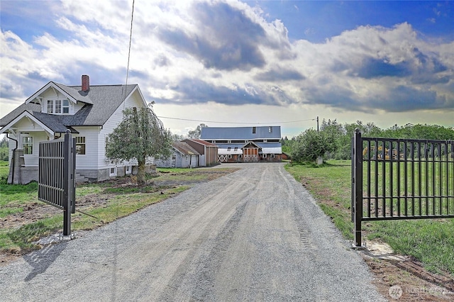 27120 36th Ave NW, Stanwood, WA 98292 - view of dirt / gravel driveway with a gated entry