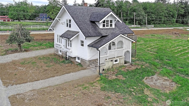 27120 36th Ave NW, Stanwood, WA 98292 - view of front facade featuring a chimney, dirt driveway, and roof with shingles