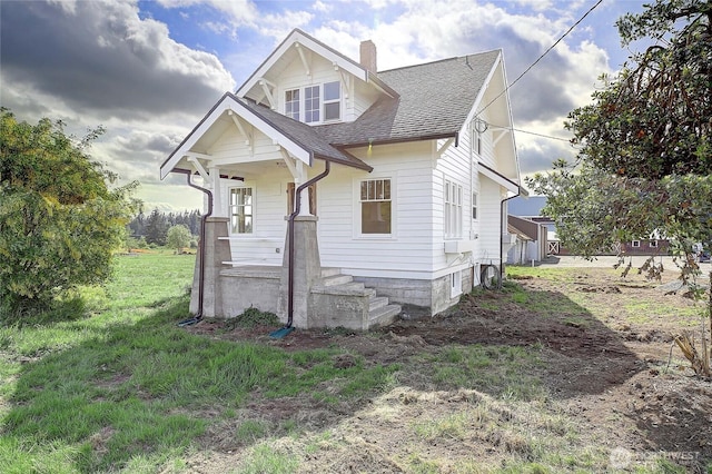 27120 36th Ave NW, Stanwood, WA 98292 - view of front of property with roof with shingles, a chimney, and a front lawn