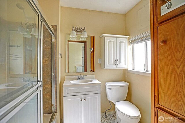 27120 36th Ave NW, Stanwood, WA 98292 - bathroom with a shower with door, vanity, and toilet