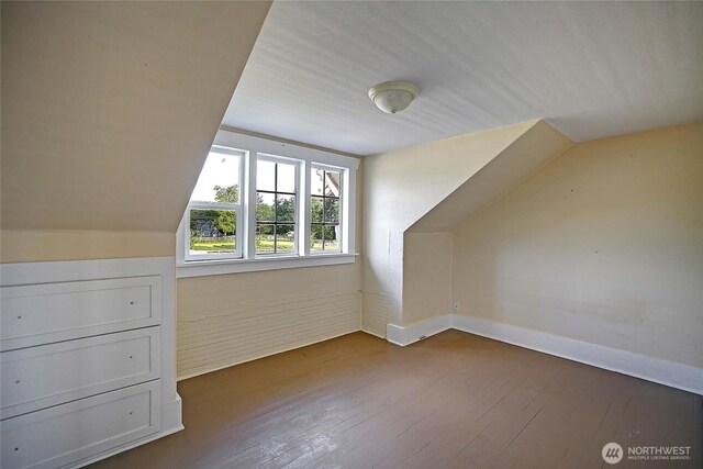 27120 36th Ave NW, Stanwood, WA 98292 - additional living space featuring dark wood-type flooring, lofted ceiling, and baseboards