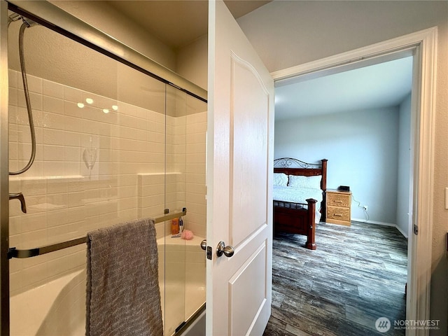 642 Weatherwax Loop NE, Ocean Shores, WA 98569 - full bathroom with a shower with door and wood finished floors